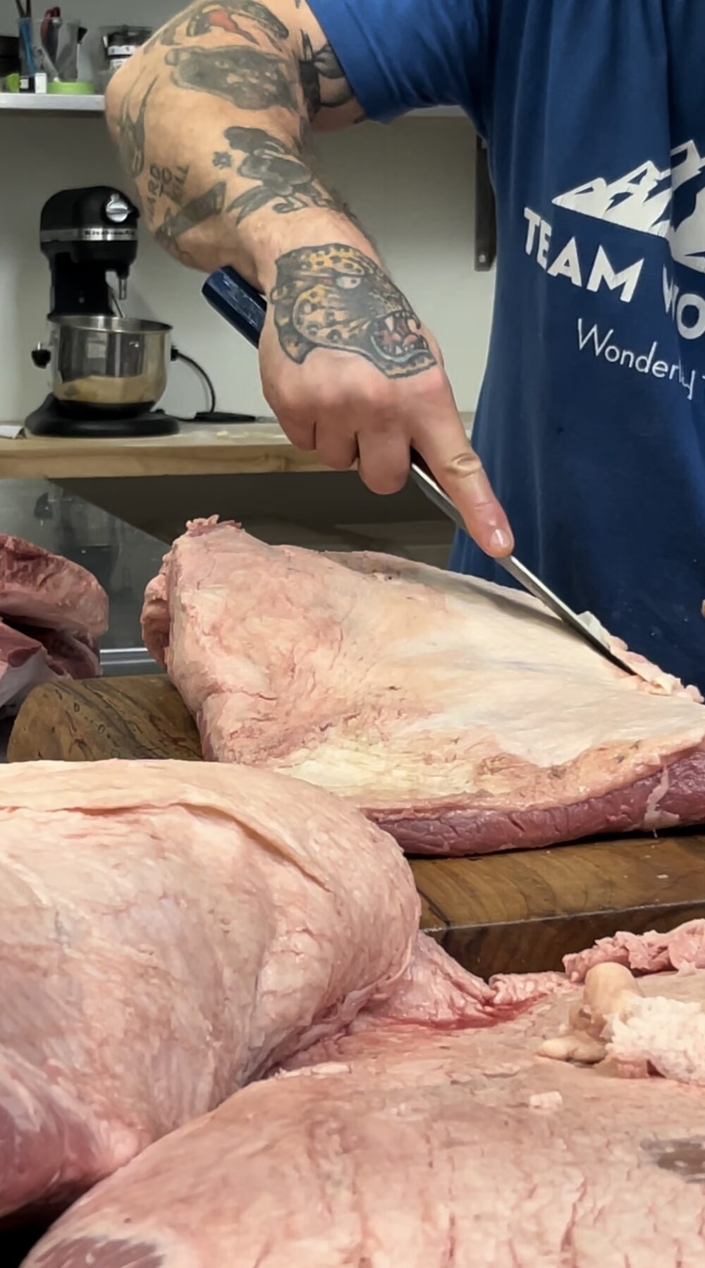 Nick prepping brisket in the kitchen